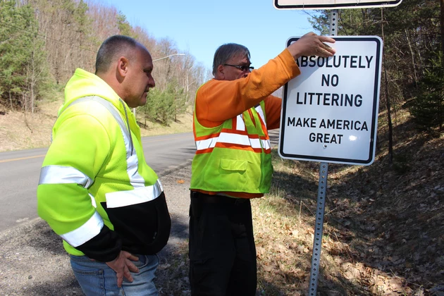 A City of Binghamton worker removed a "Make America Great" anti-litter sign on April 18, 2017. (Photo: Bob Joseph/WNBF News)