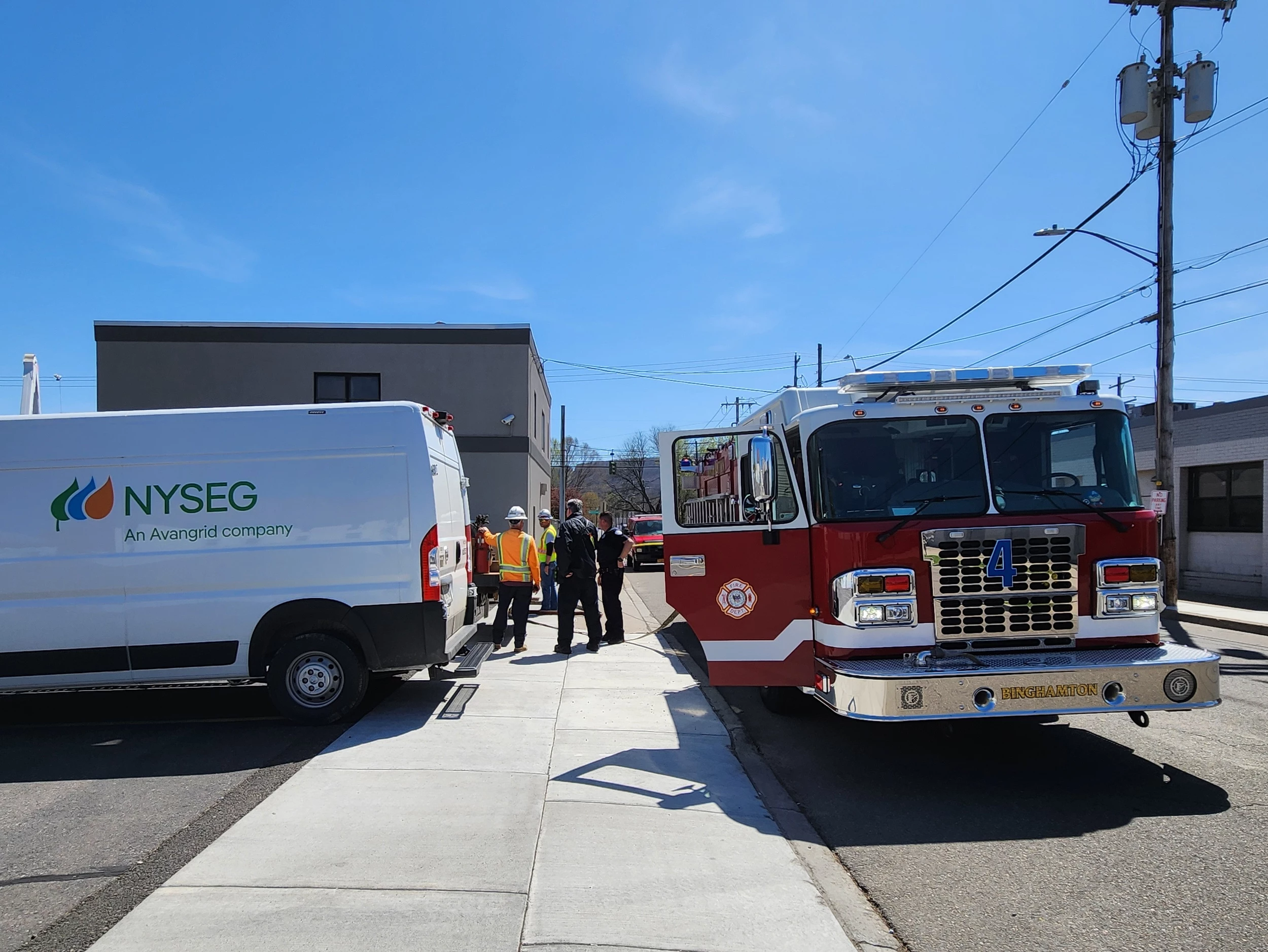 A NYSEG vehicle and a Binghamton Fire Department truck on Griswold Street on April 23, 2024. Photo: Bob Joseph/WNBF News